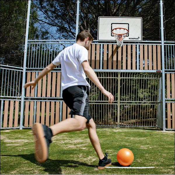 Artificial plastic timber effect panelled MUGA with steel framed enclosure